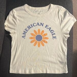 American Eagle short graphic tee, size XL, cream color w/ flower graphic